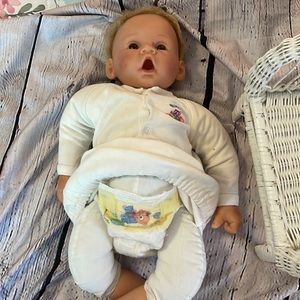 Vintage Doll, Newborn Cloth 19'. Chair included.
